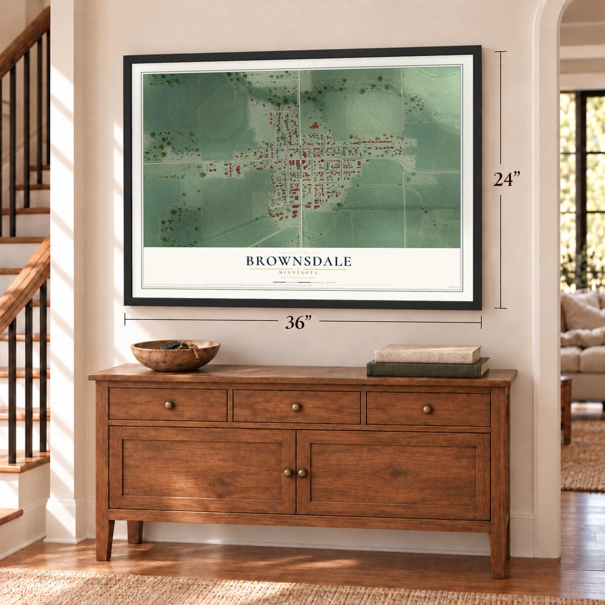 Brownsdale, Minnesota map, 24 x 36 inch print in a black frame above a dresser by a staircase