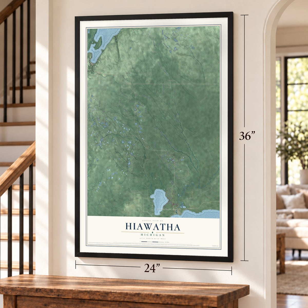 Hiawatha, Michigan map, 24 x 36 inch print in a black frame by a staircase
