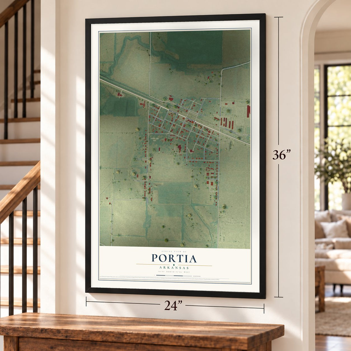 Portia, Arkansas map, 24 x 36 inch print in a black frame by a staircase