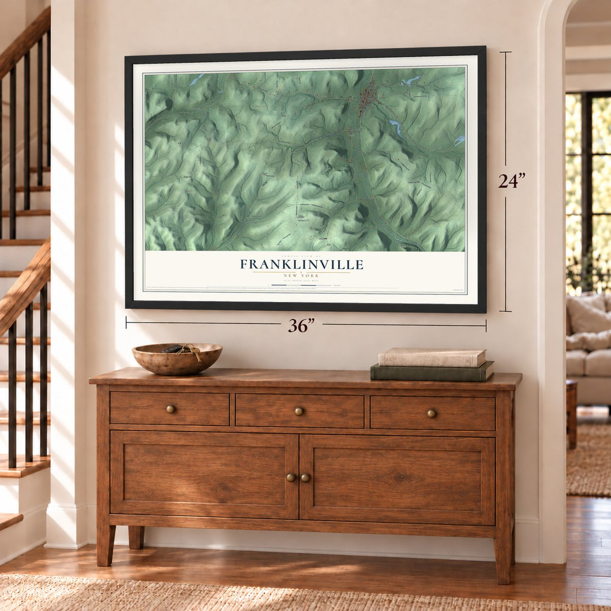 Franklinville, New York map, 24 x 36 inch print in a black frame above a dresser by a staircase