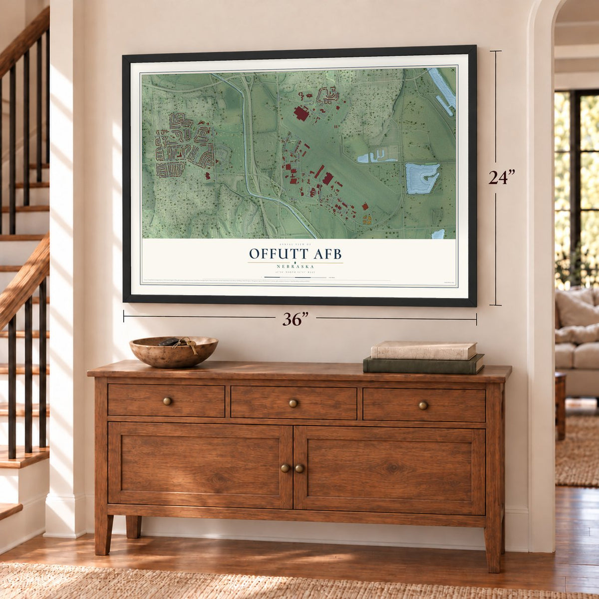 Offutt AFB, Nebraska map, 24 x 36 inch print in a black frame above a dresser by a staircase