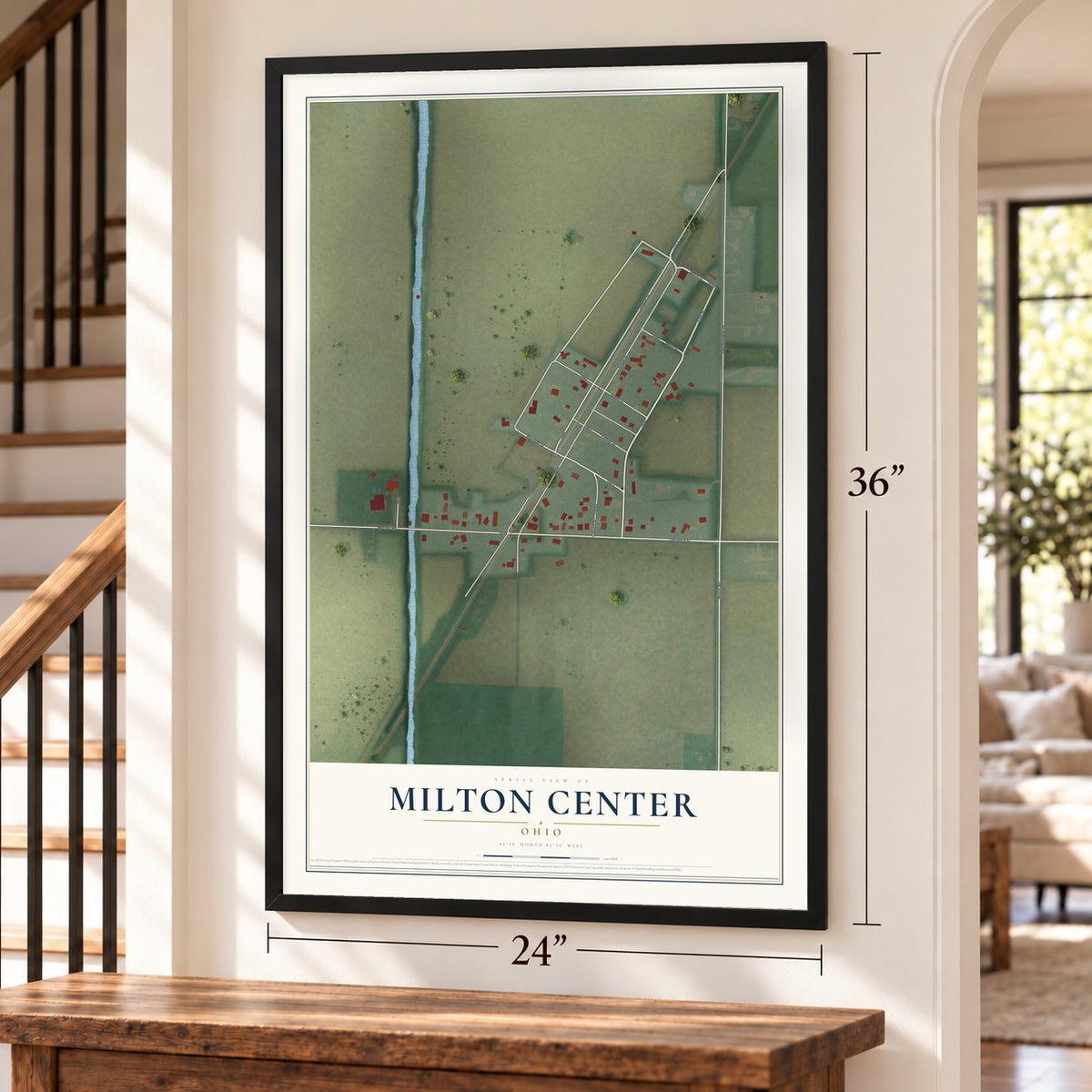 Milton Center, Ohio map, 24 x 36 inch print in a black frame by a staircase