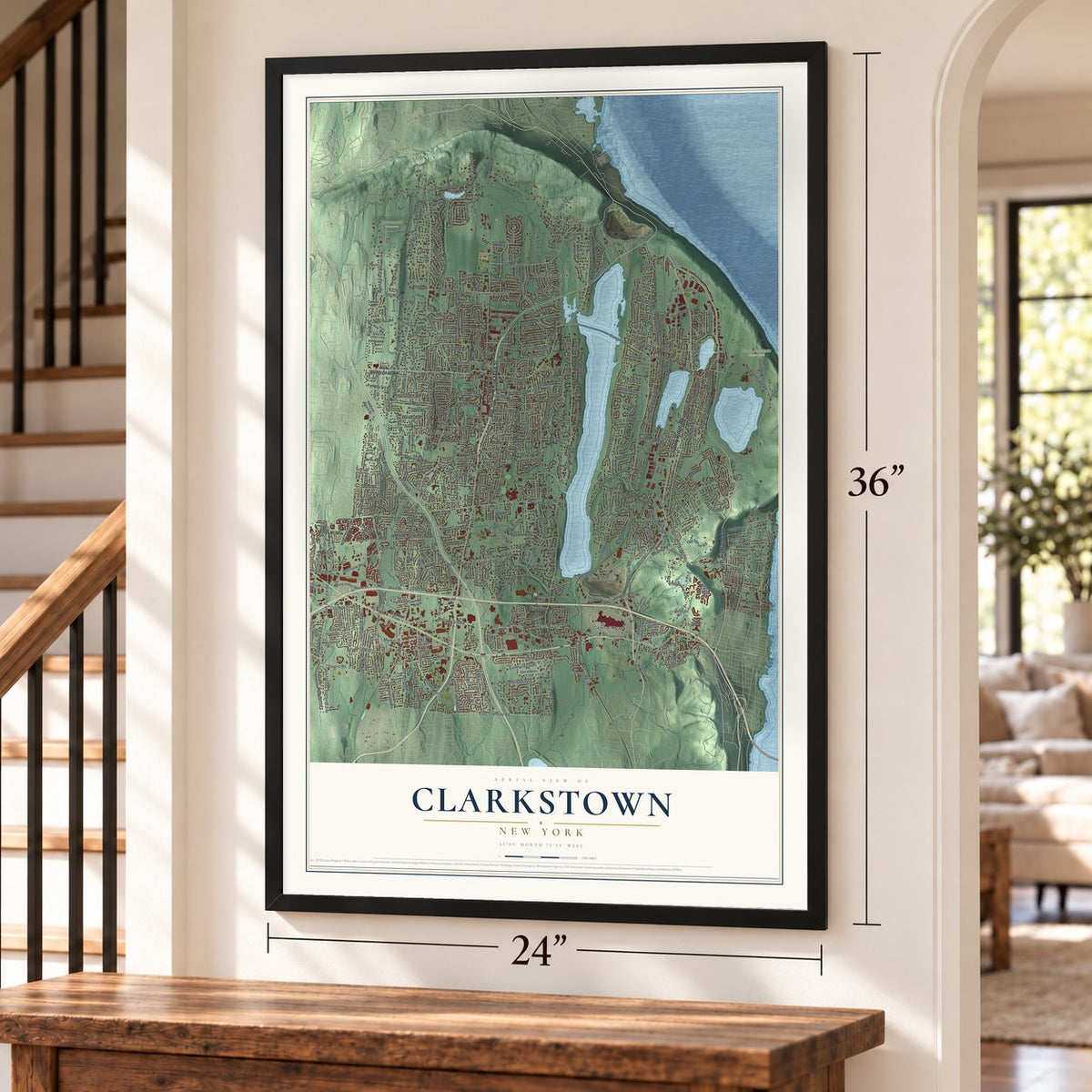 Clarkstown, New York map, 24 x 36 inch print in a black frame by a staircase