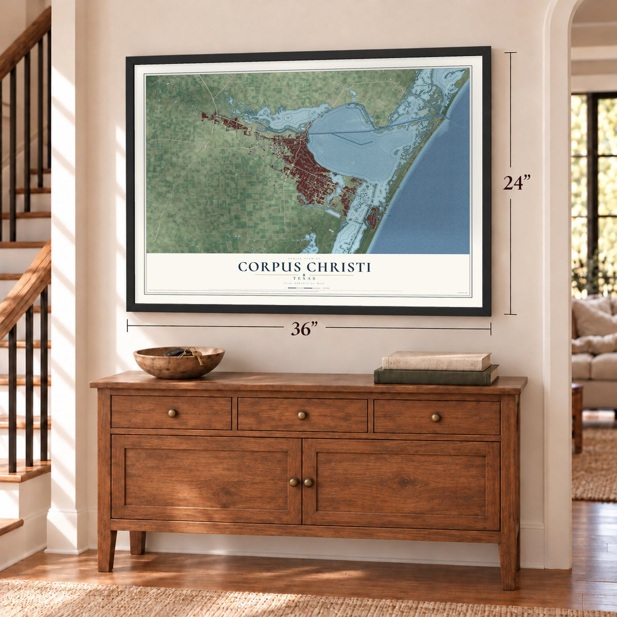 Corpus Christi, Texas map, 24 x 36 inch print in a black frame above a dresser by a staircase