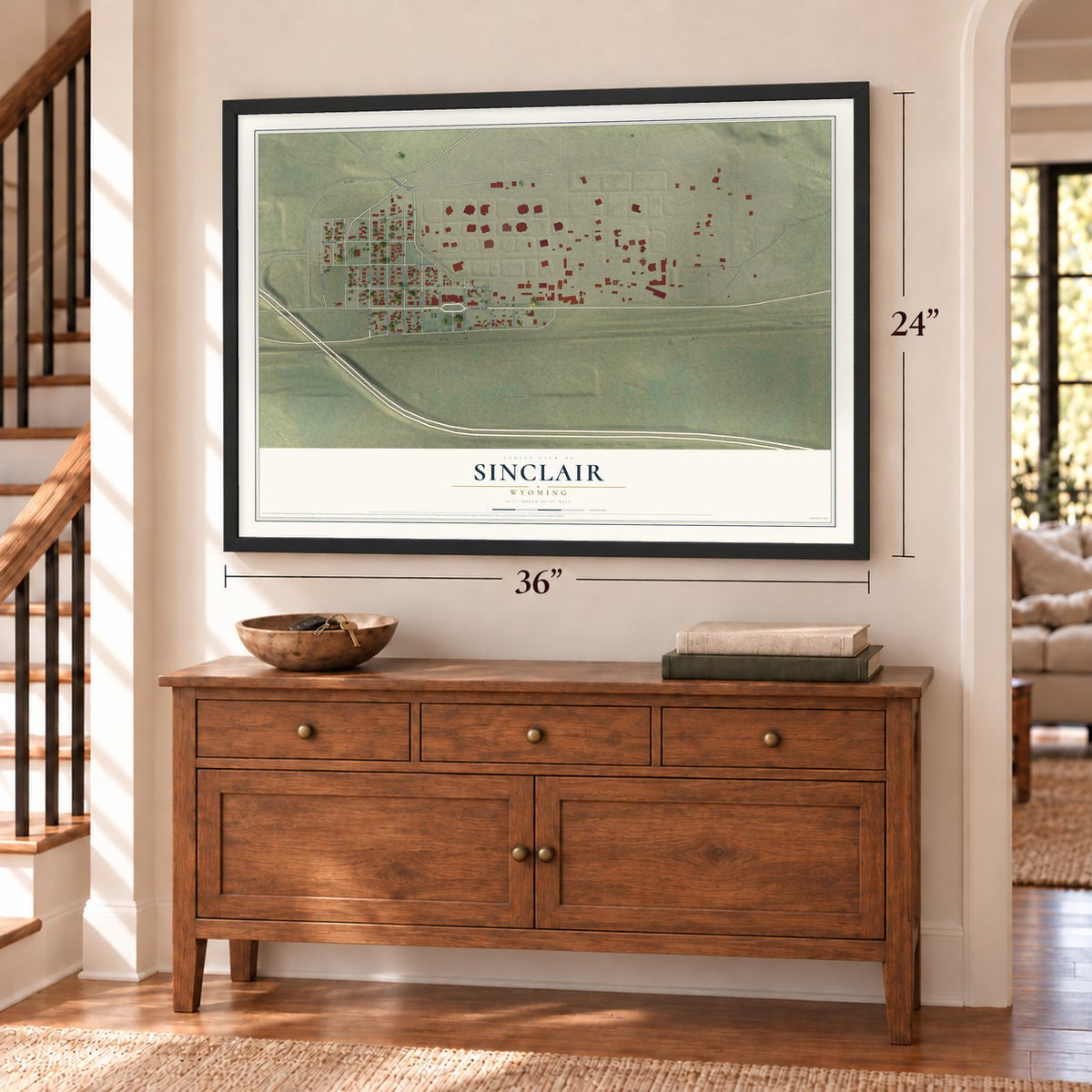 Sinclair, Wyoming map, 24 x 36 inch print in a black frame above a dresser by a staircase