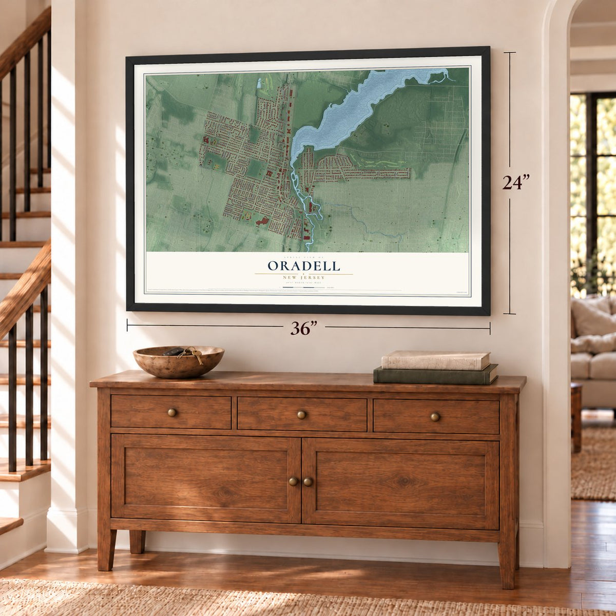 Oradell, New Jersey map, 24 x 36 inch print in a black frame above a dresser by a staircase