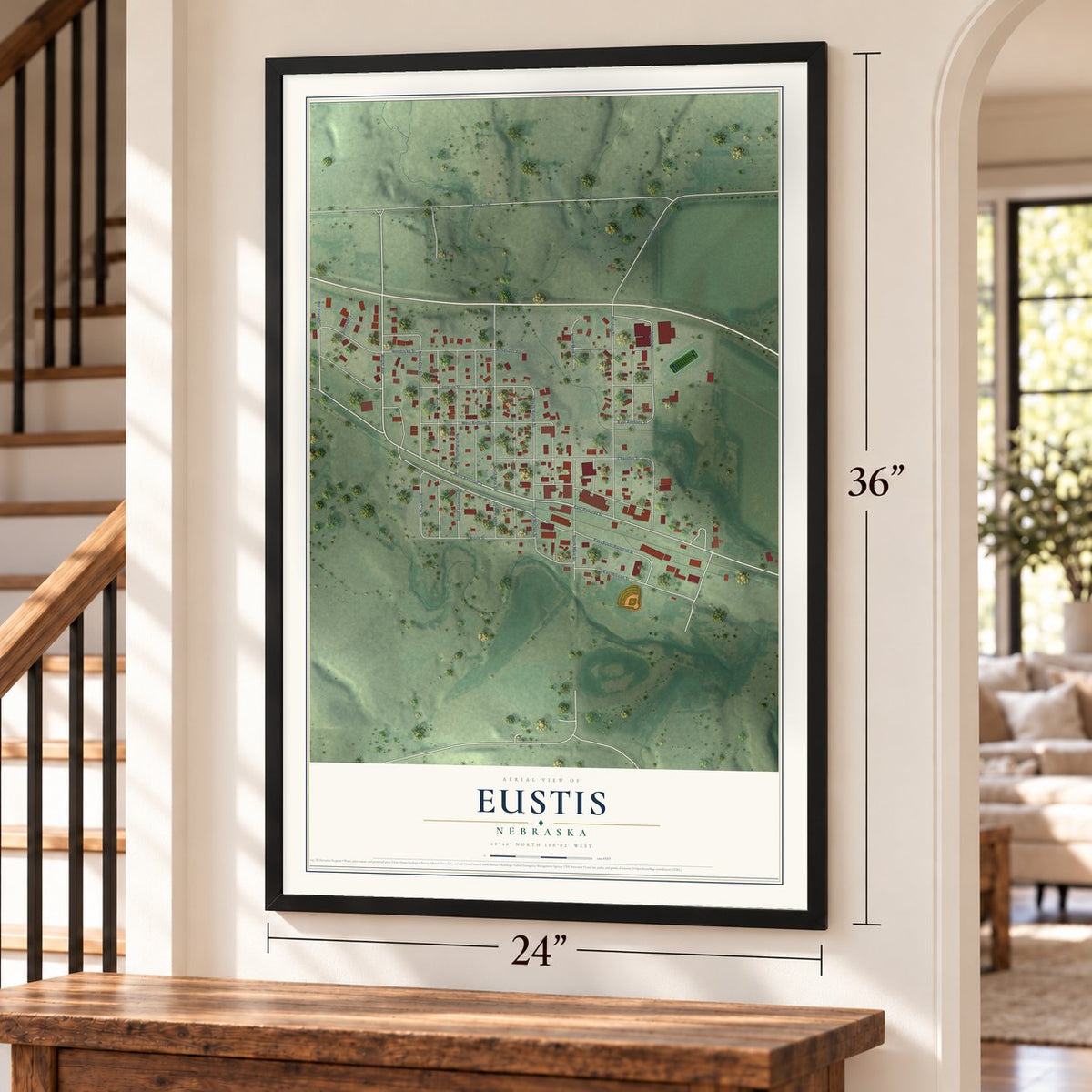 Eustis, Nebraska map, 24 x 36 inch print in a black frame by a staircase