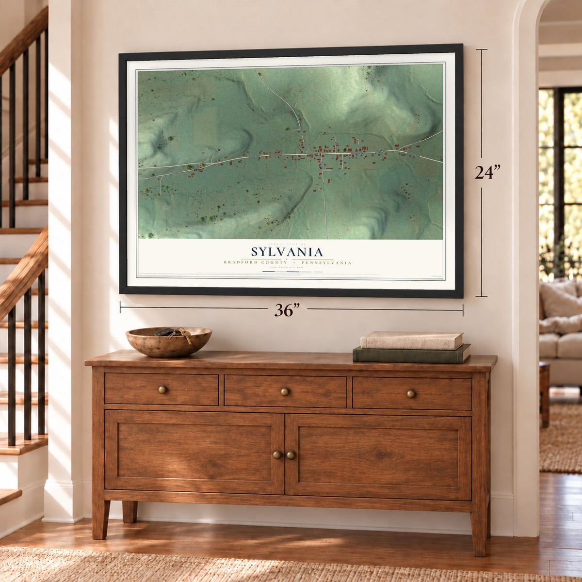 Sylvania, Bradford County, Pennsylvania map, 24 x 36 inch print in a black frame above a dresser by a staircase