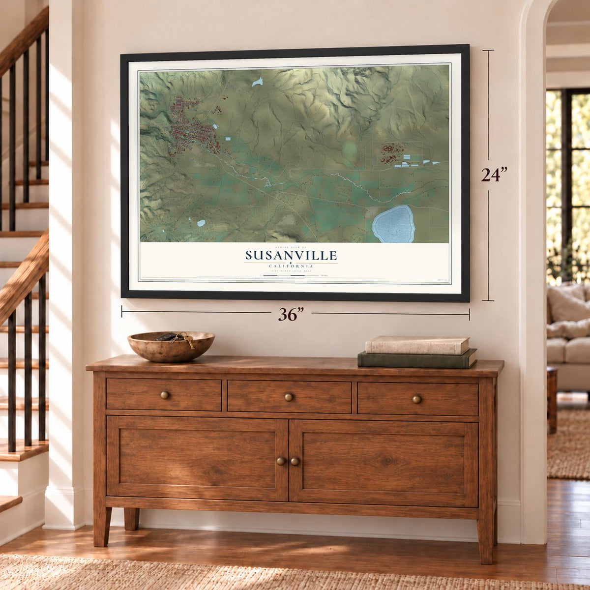 Susanville, California map, 24 x 36 inch print in a black frame above a dresser by a staircase