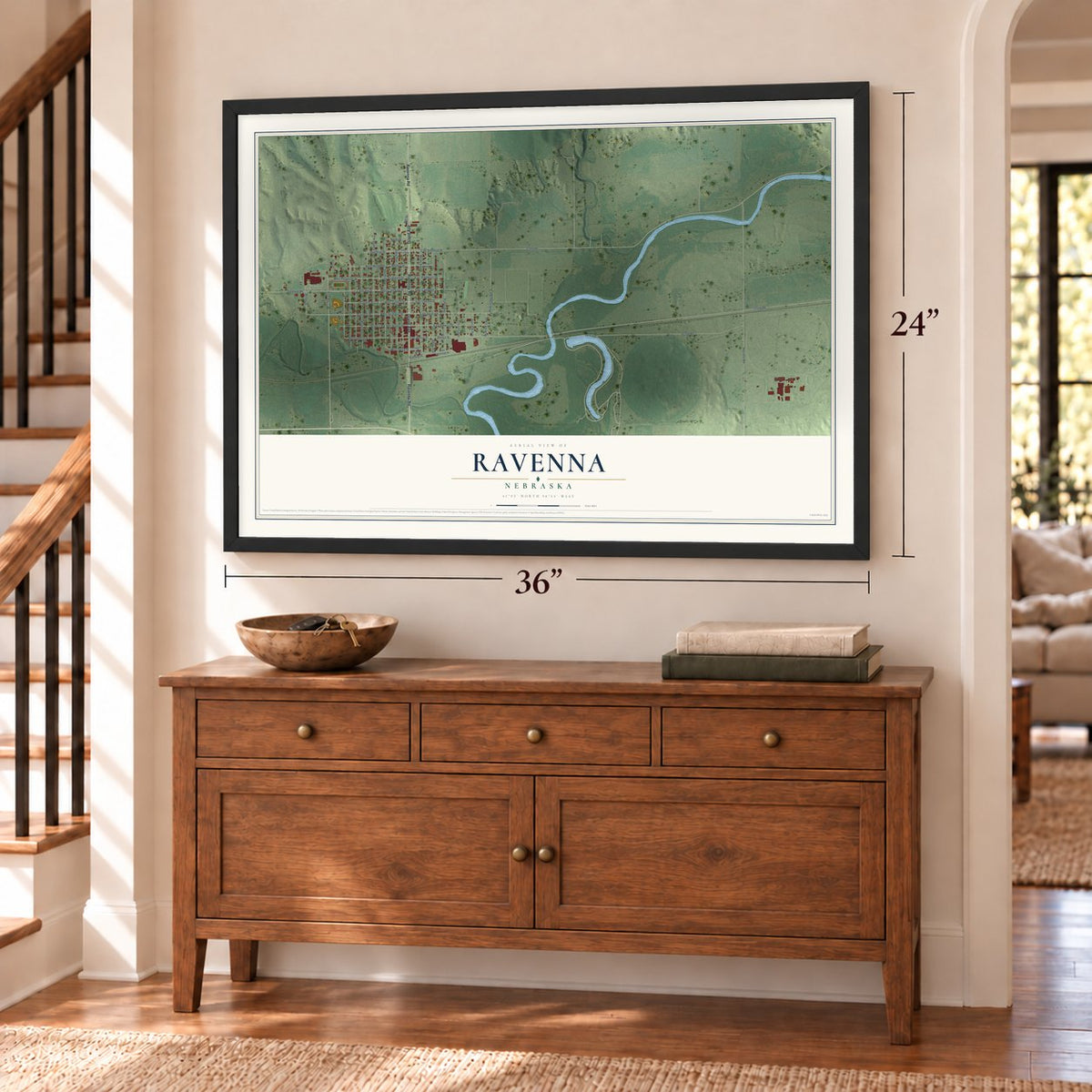 Ravenna, Nebraska map, 24 x 36 inch print in a black frame above a dresser by a staircase
