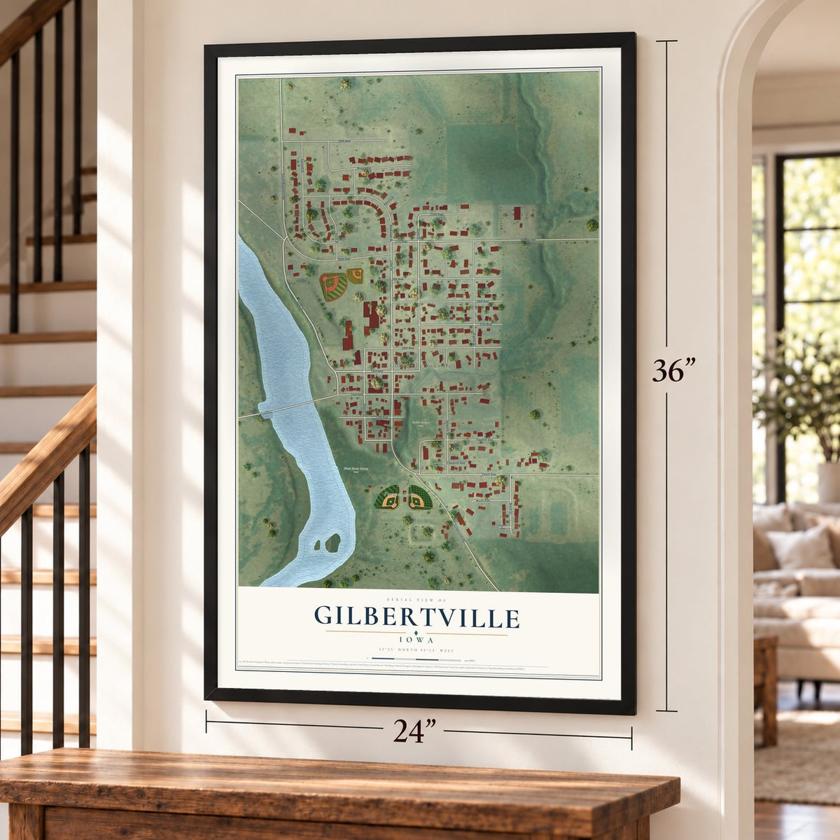 Gilbertville, Iowa map, 24 x 36 inch print in a black frame by a staircase