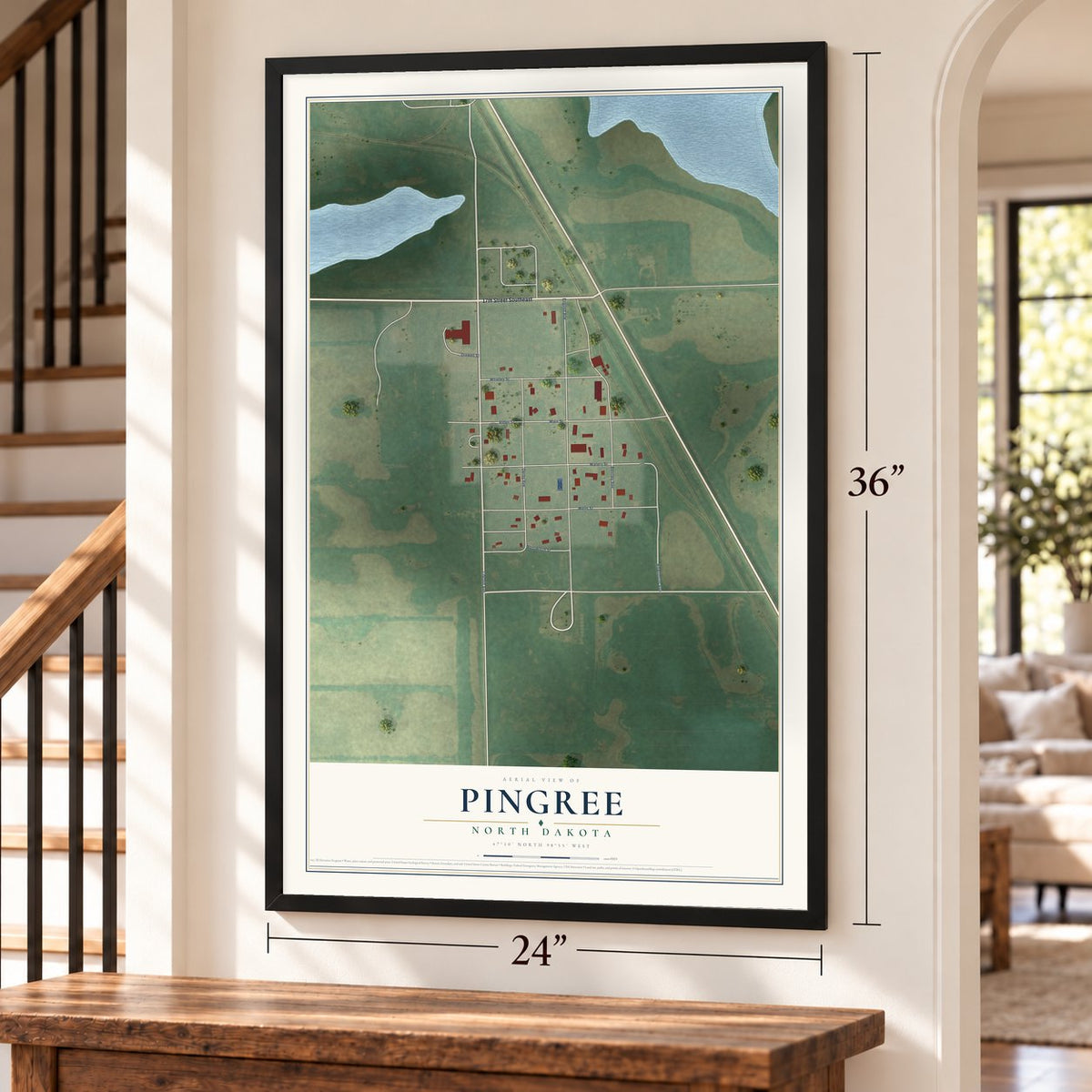 Pingree, North Dakota map, 24 x 36 inch print in a black frame by a staircase