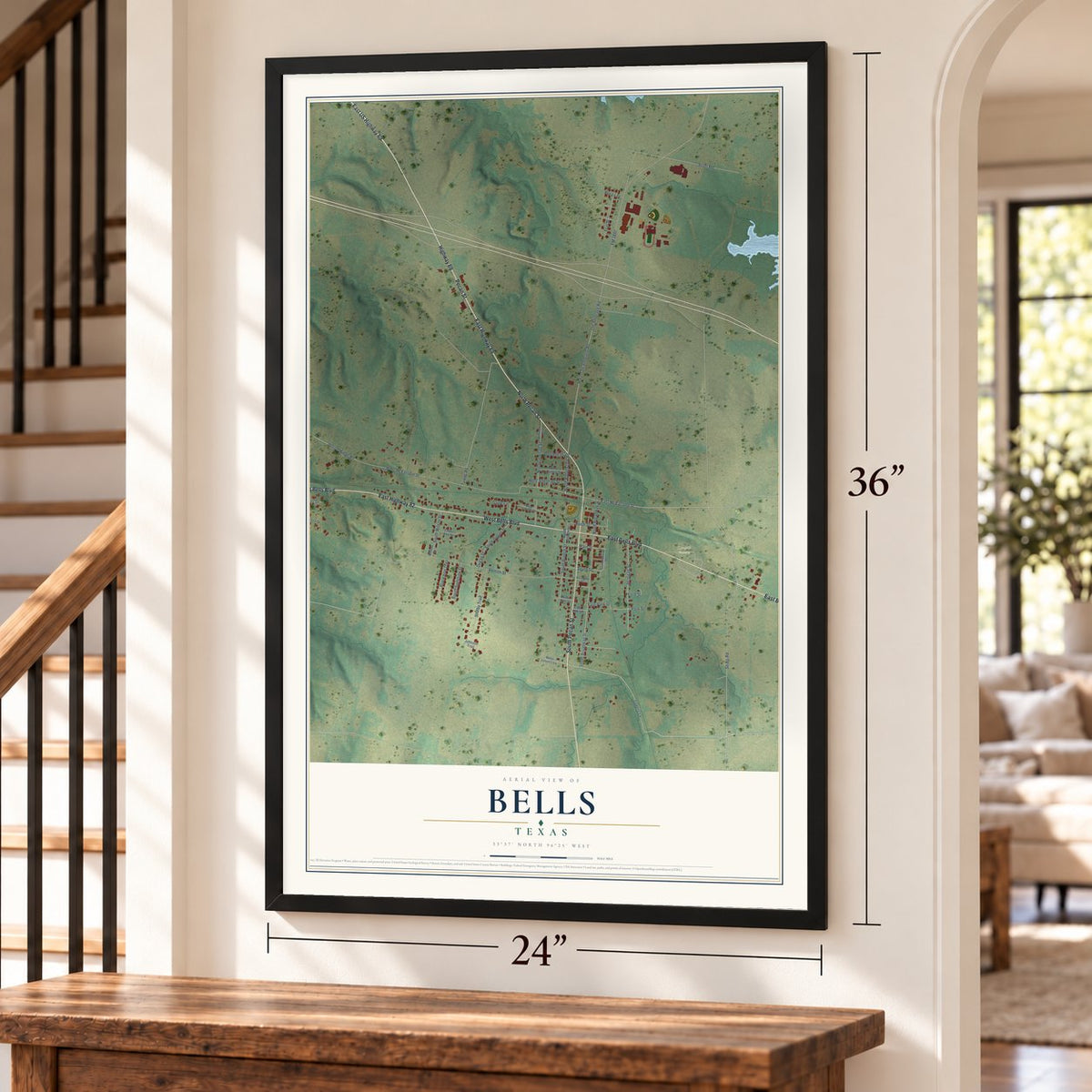 Bells, Texas map, 24 x 36 inch print in a black frame by a staircase