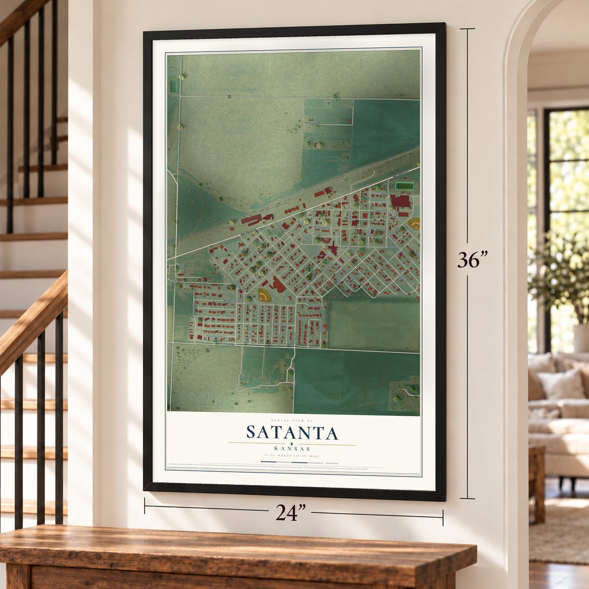 Satanta, Kansas map, 24 x 36 inch print in a black frame by a staircase