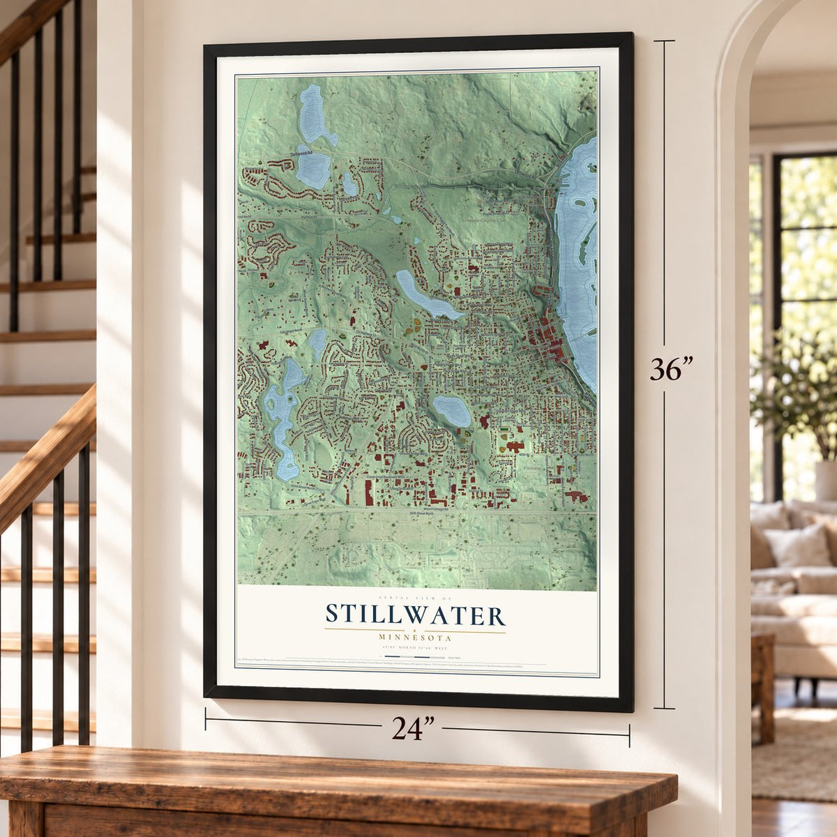 Stillwater, Minnesota map, 24 x 36 inch print in a black frame by a staircase