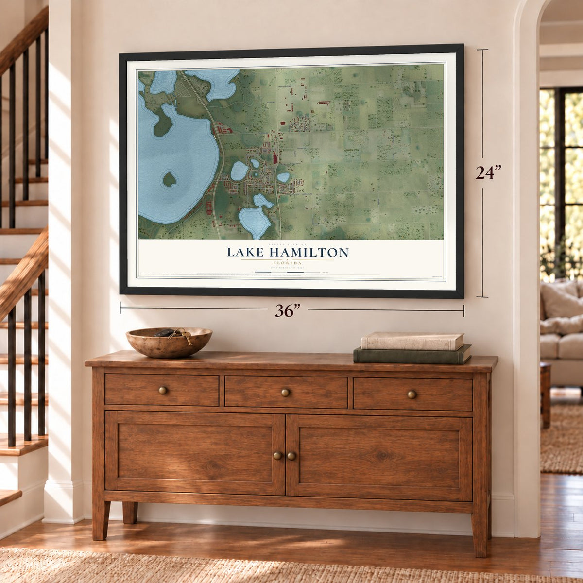 Lake Hamilton, Florida map, 24 x 36 inch print in a black frame above a dresser by a staircase