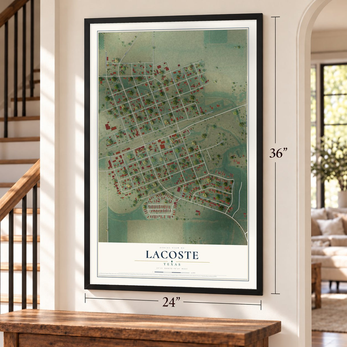 LaCoste, Texas map, 24 x 36 inch print in a black frame by a staircase