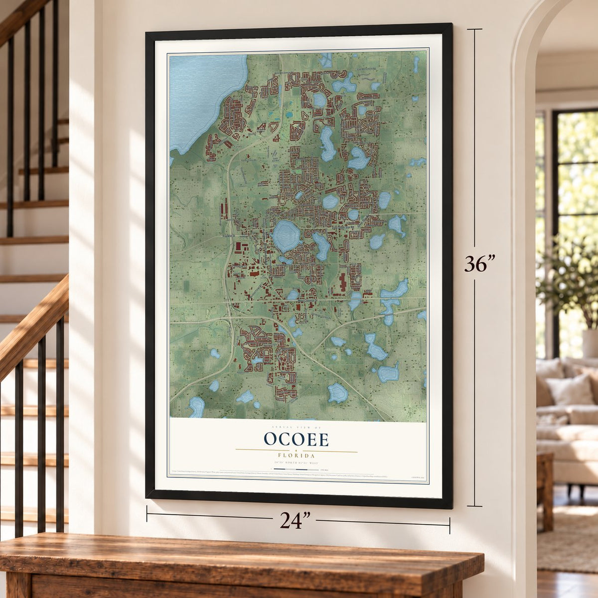 Ocoee, Florida map, 24 x 36 inch print in a black frame by a staircase