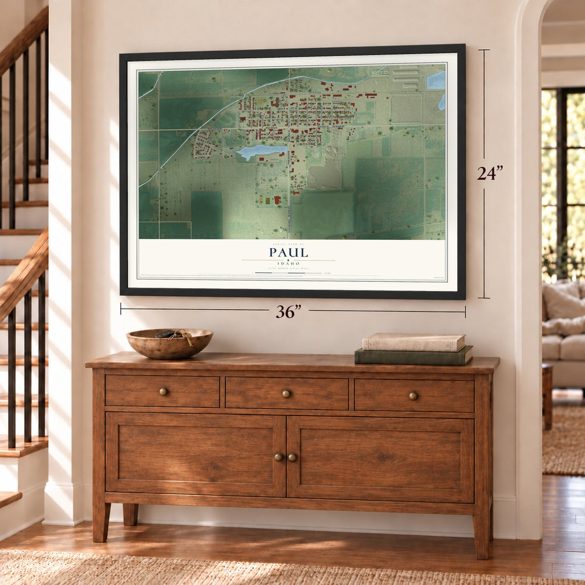 Paul, Idaho map, 24 x 36 inch print in a black frame above a dresser by a staircase
