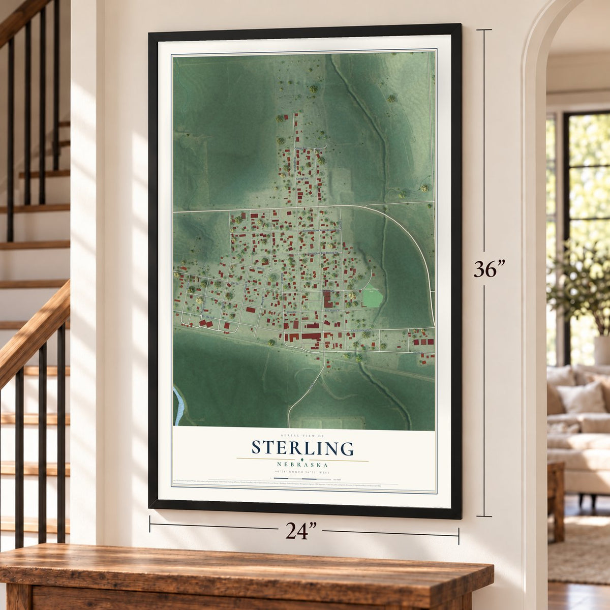 Sterling, Nebraska map, 24 x 36 inch print in a black frame by a staircase