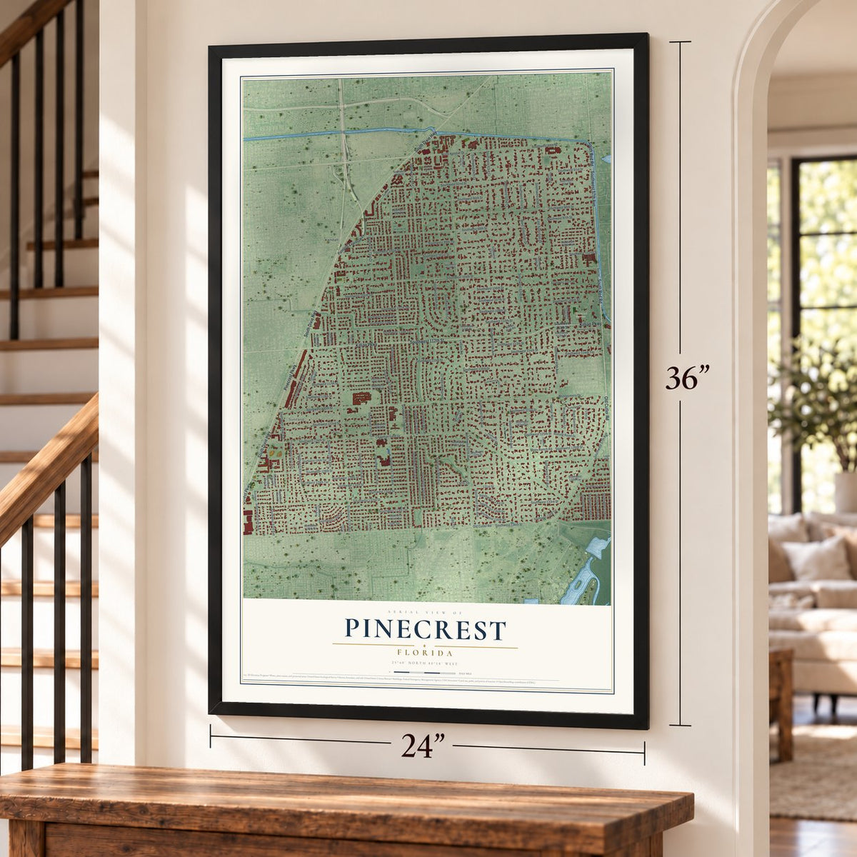 Pinecrest, Florida map, 24 x 36 inch print in a black frame by a staircase