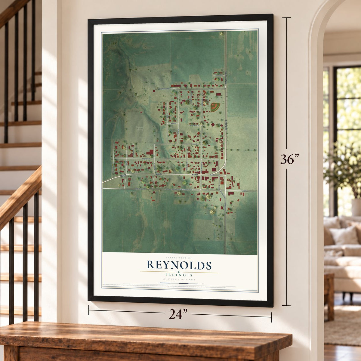 Reynolds, Illinois map, 24 x 36 inch print in a black frame by a staircase