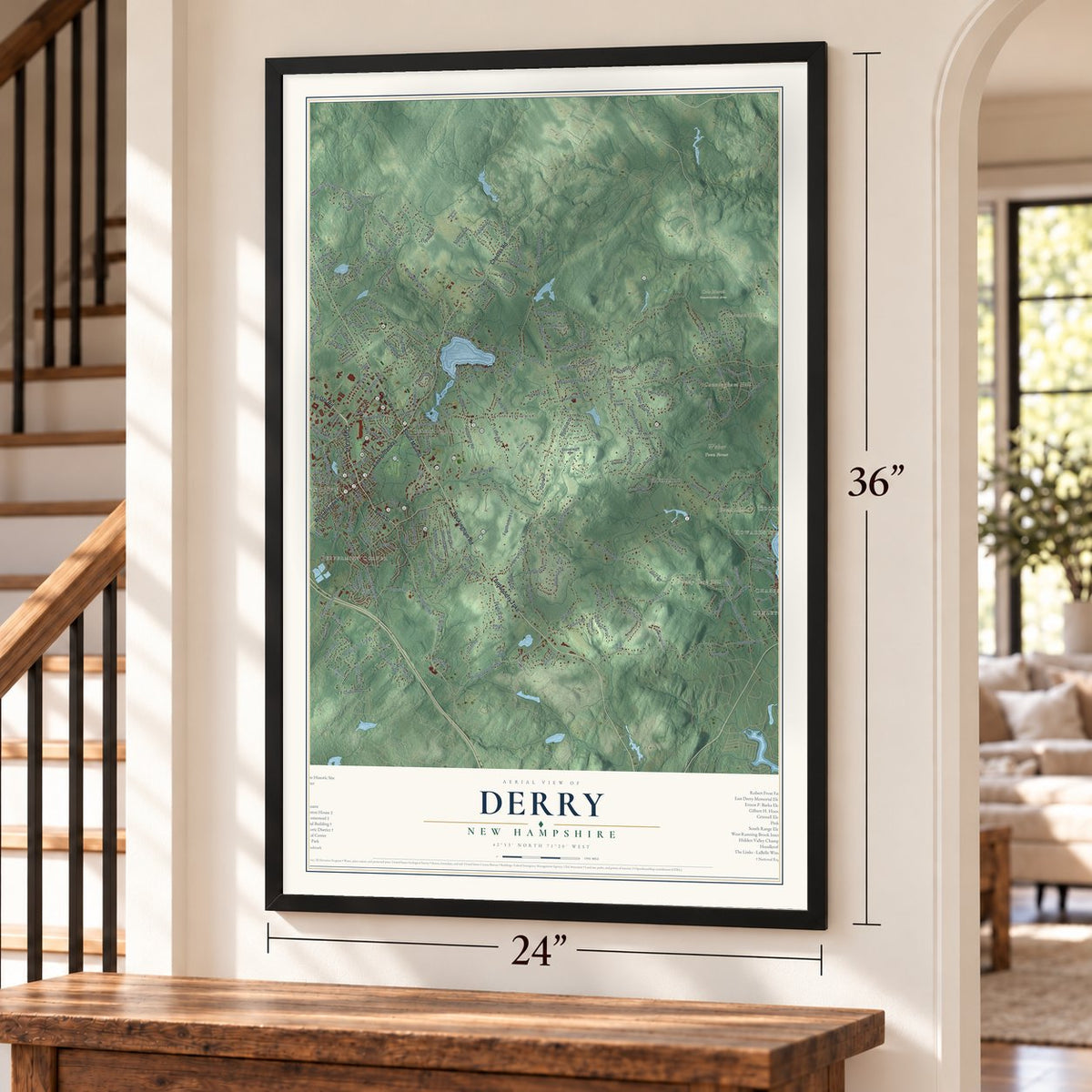 Derry, New Hampshire map, 24 x 36 inch print in a black frame by a staircase