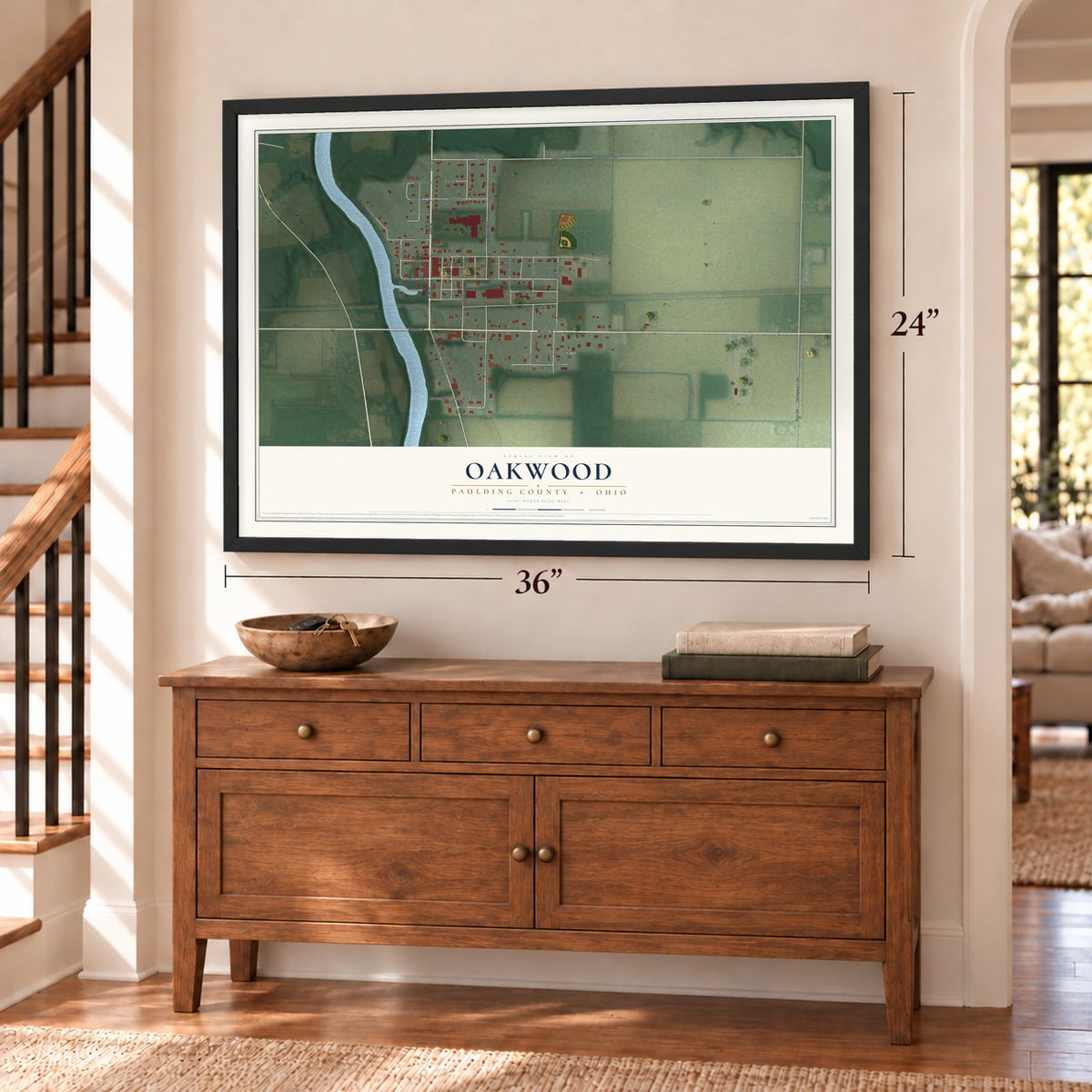 Oakwood, Paulding County, Ohio map, 24 x 36 inch print in a black frame above a dresser by a staircase