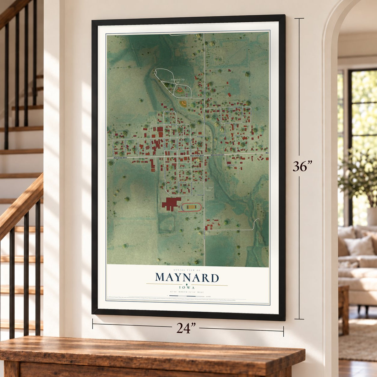 Maynard, Iowa map, 24 x 36 inch print in a black frame by a staircase