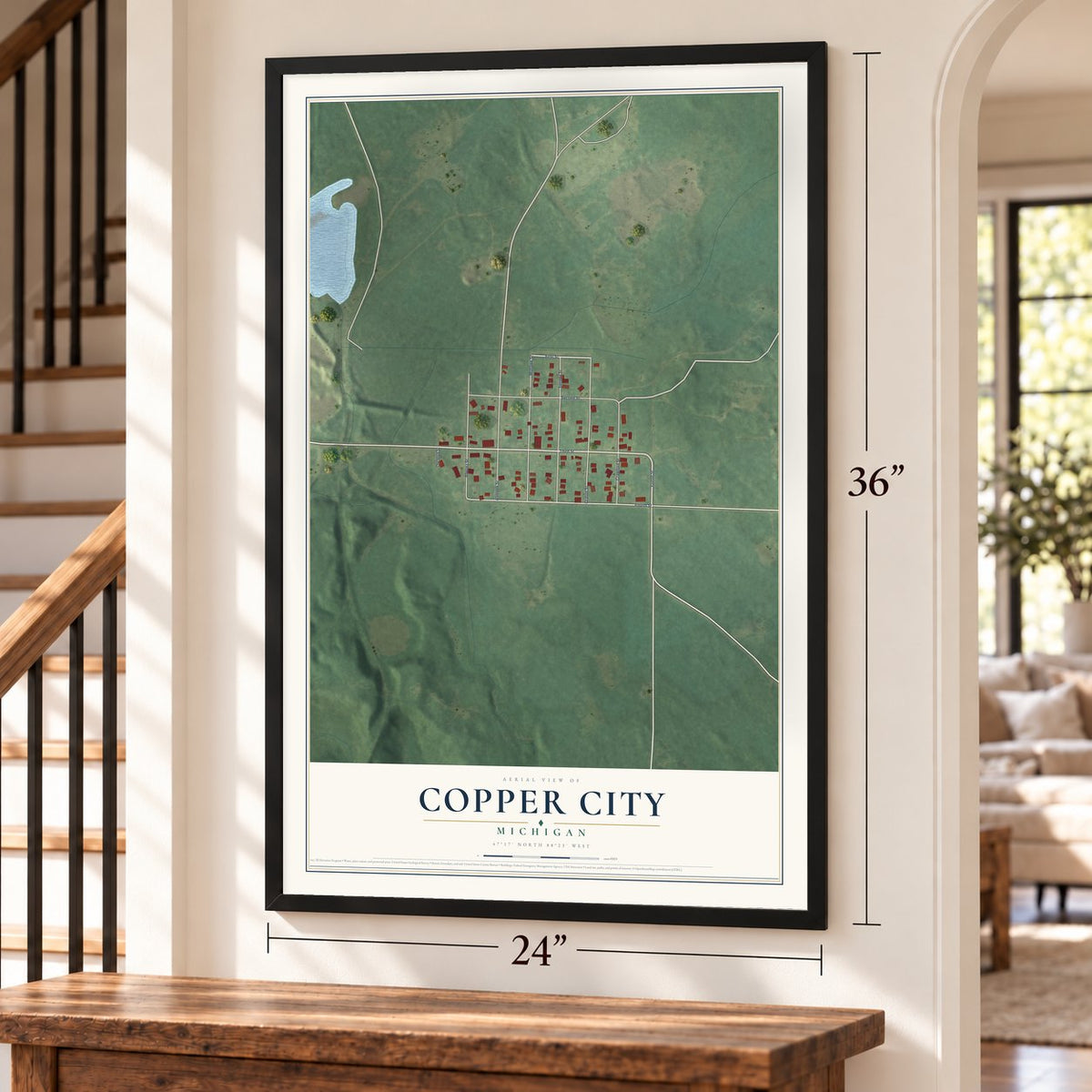Copper City, Michigan map, 24 x 36 inch print in a black frame by a staircase
