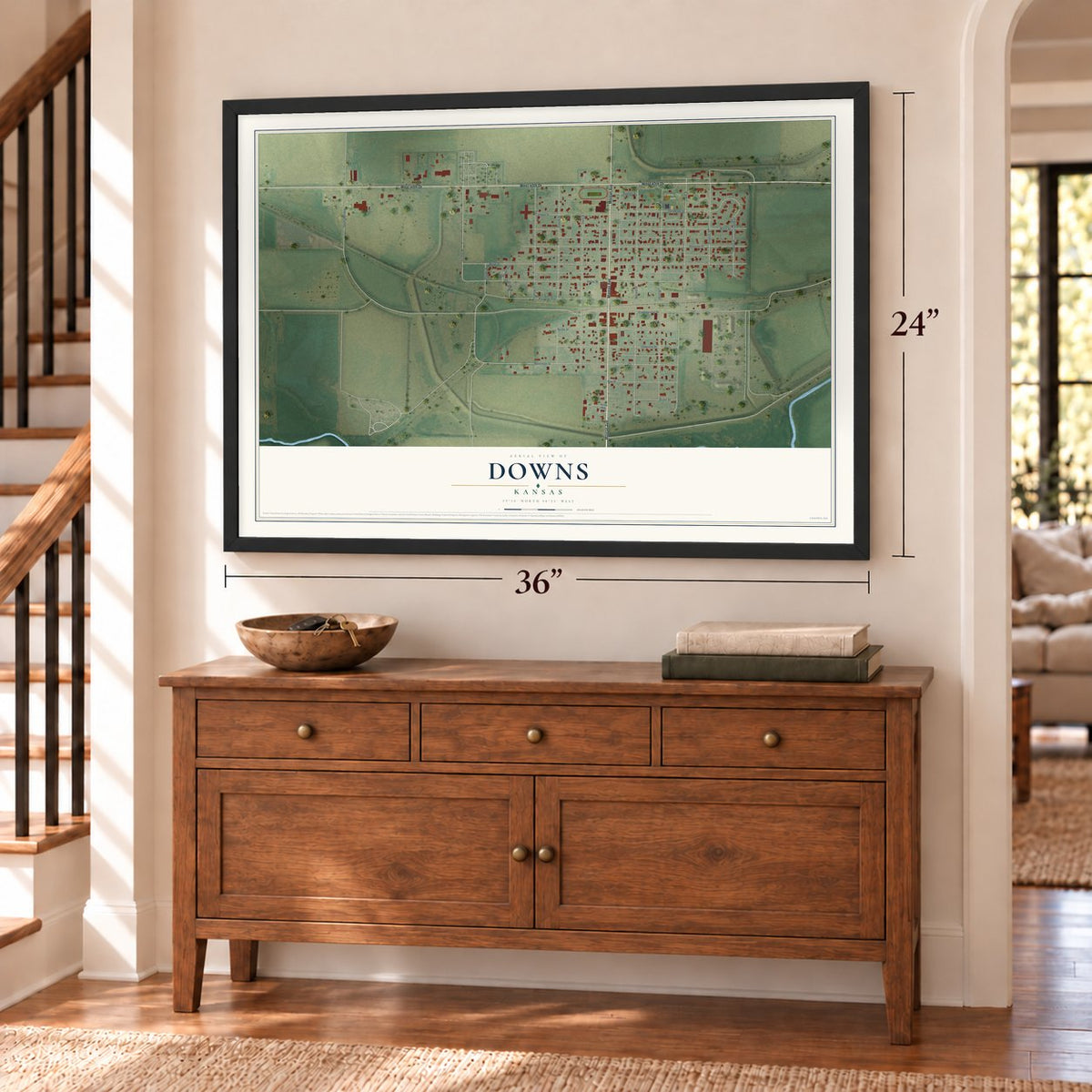 Downs, Kansas map, 24 x 36 inch print in a black frame above a dresser by a staircase