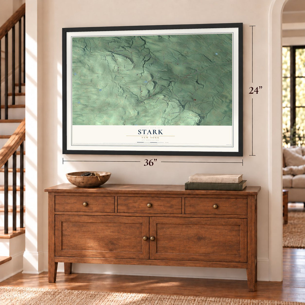Stark, New York map, 24 x 36 inch print in a black frame above a dresser by a staircase