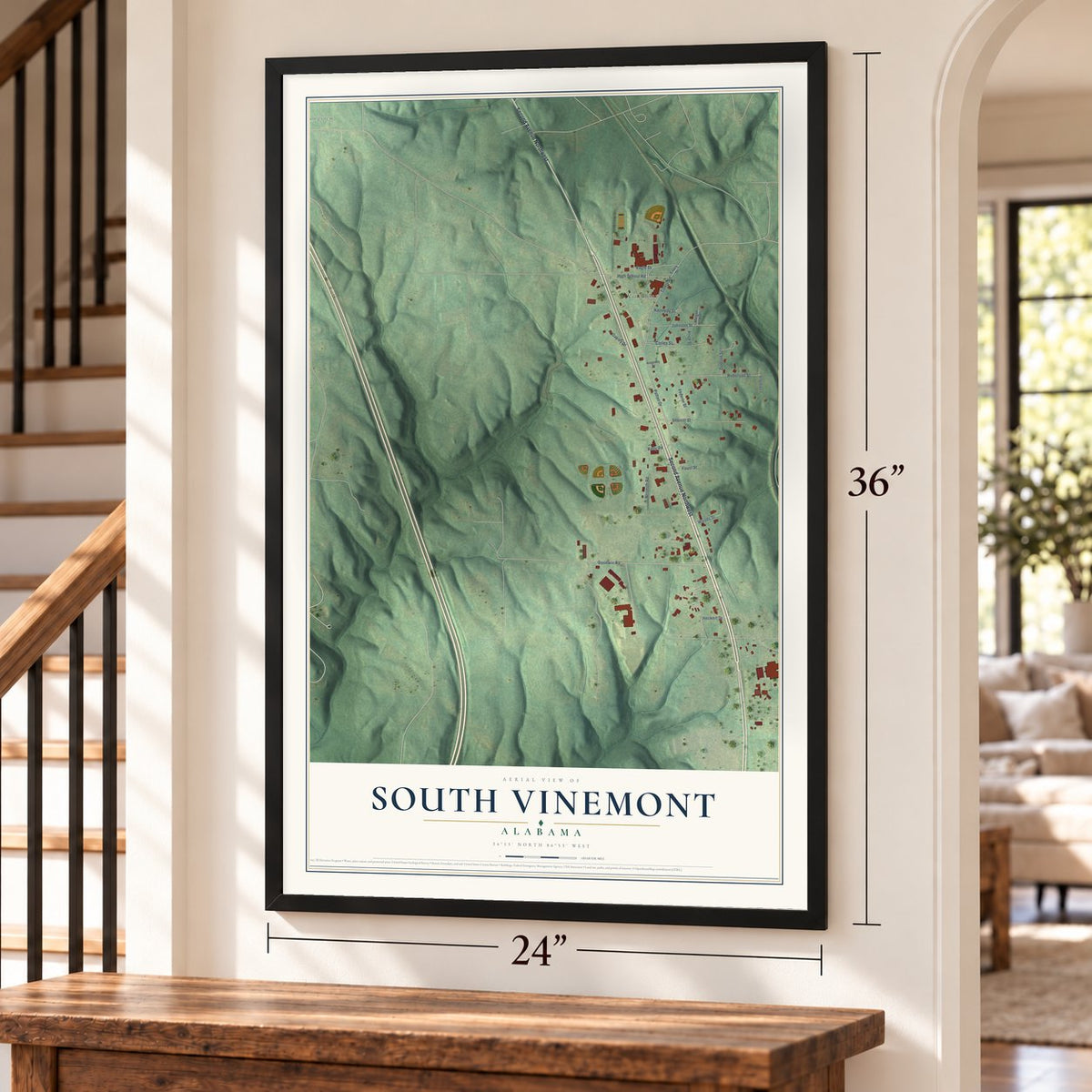 South Vinemont, Alabama map, 24 x 36 inch print in a black frame by a staircase
