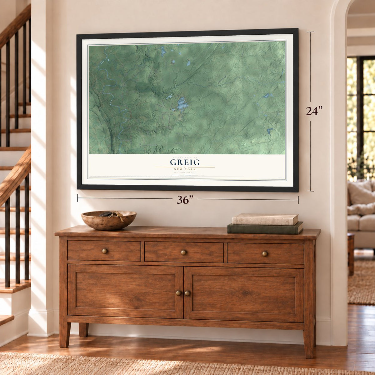Greig, New York map, 24 x 36 inch print in a black frame above a dresser by a staircase