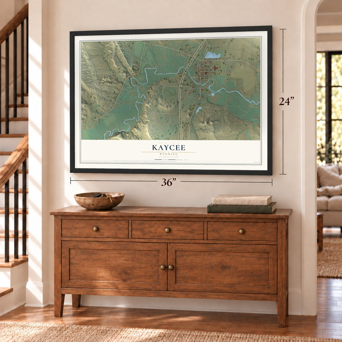 Kaycee, Wyoming map, 24 x 36 inch print in a black frame above a dresser by a staircase