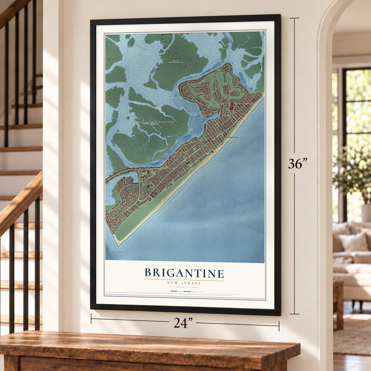 Brigantine, New Jersey map, 24 x 36 inch print in a black frame by a staircase