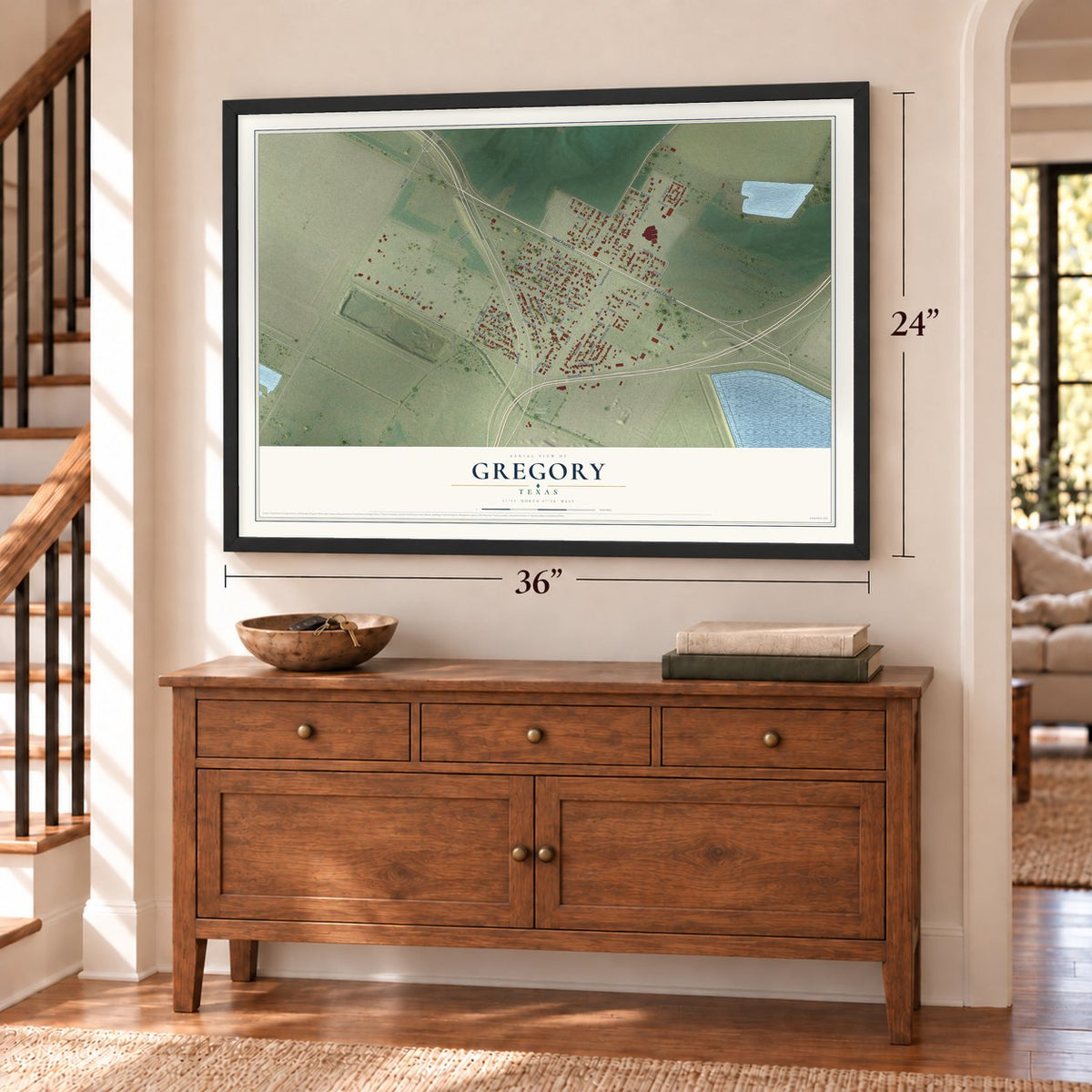 Gregory, Texas map, 24 x 36 inch print in a black frame above a dresser by a staircase