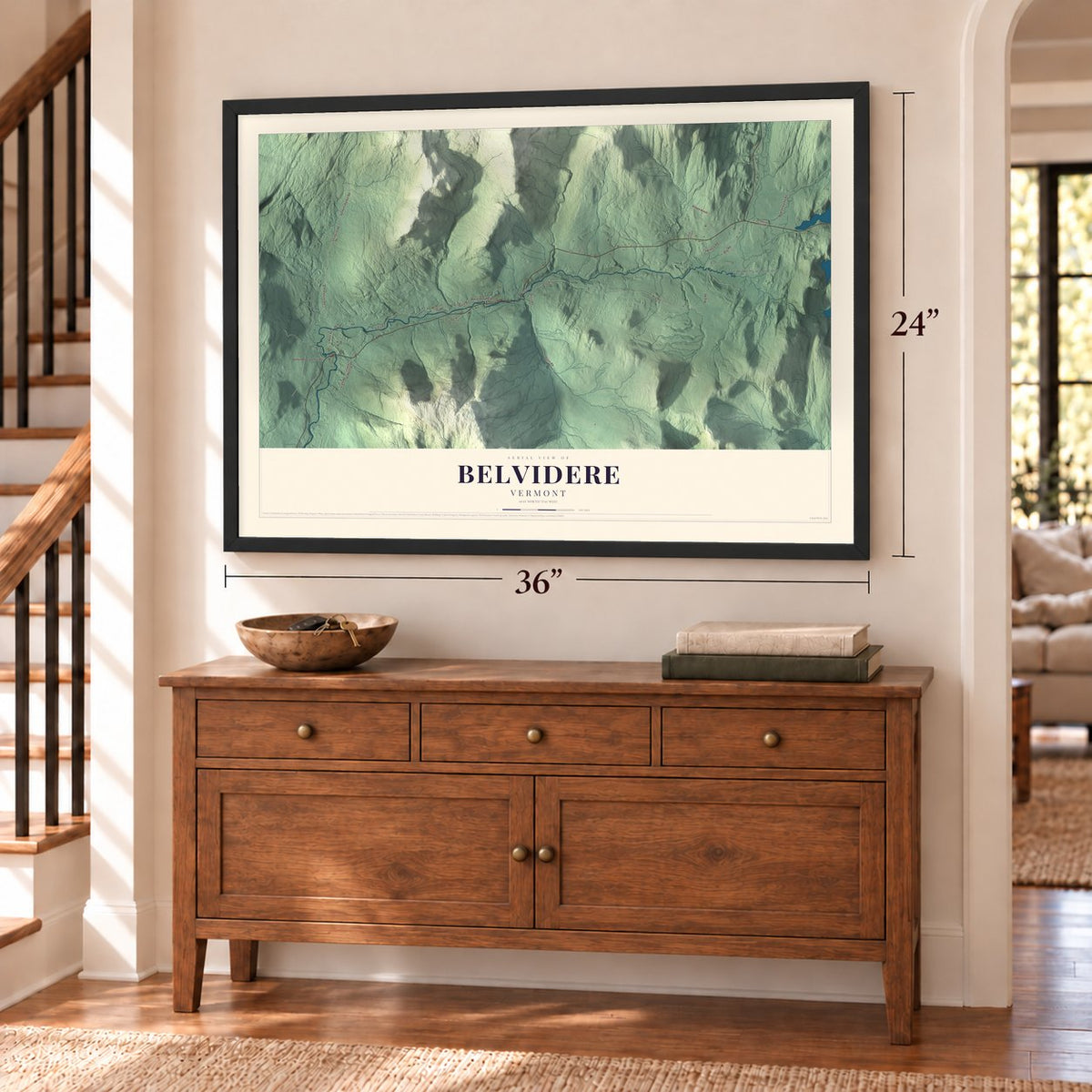 Belvidere, Vermont map, 24 x 36 inch print in a black frame above a dresser by a staircase
