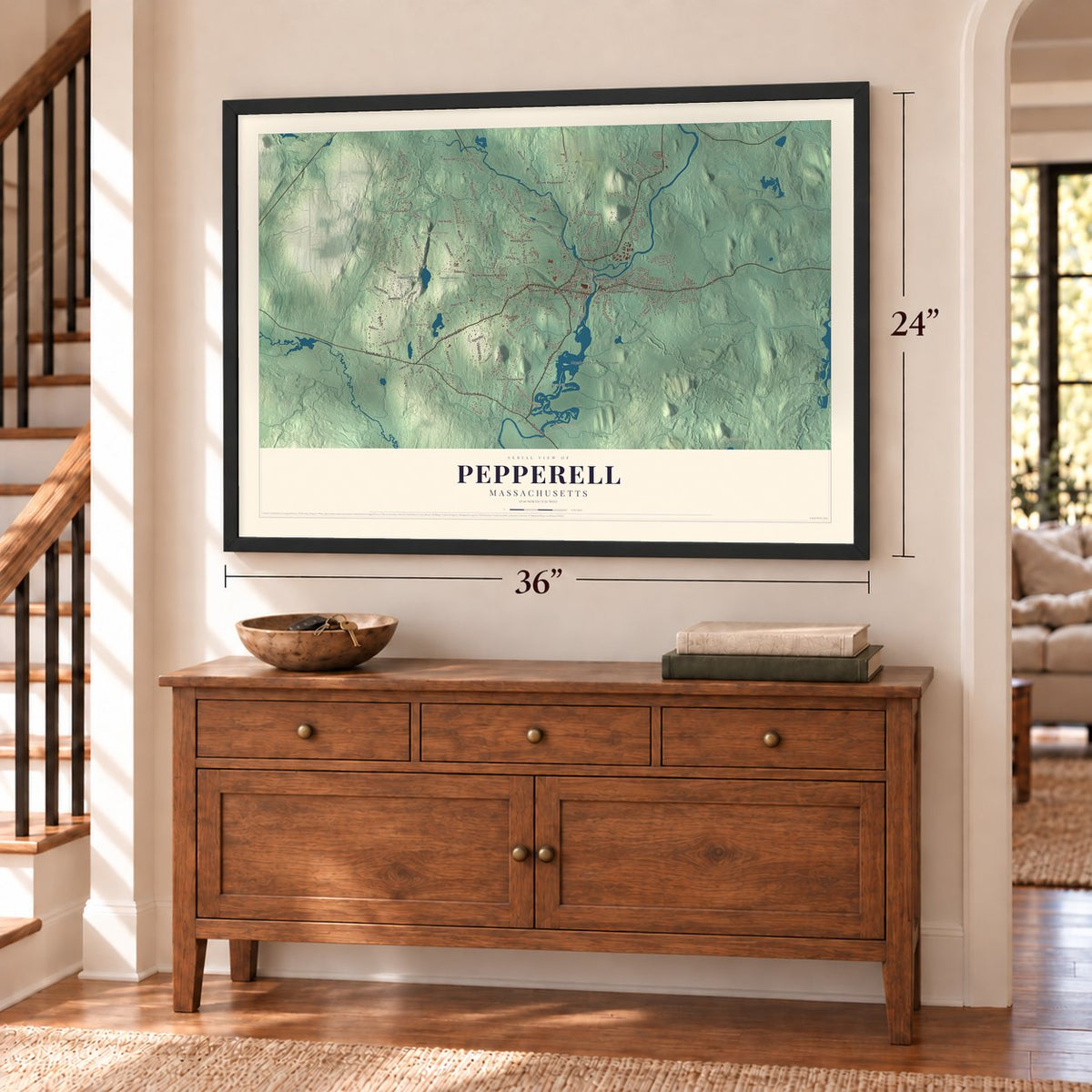 Pepperell, Massachusetts map, 24 x 36 inch print in a black frame above a dresser by a staircase