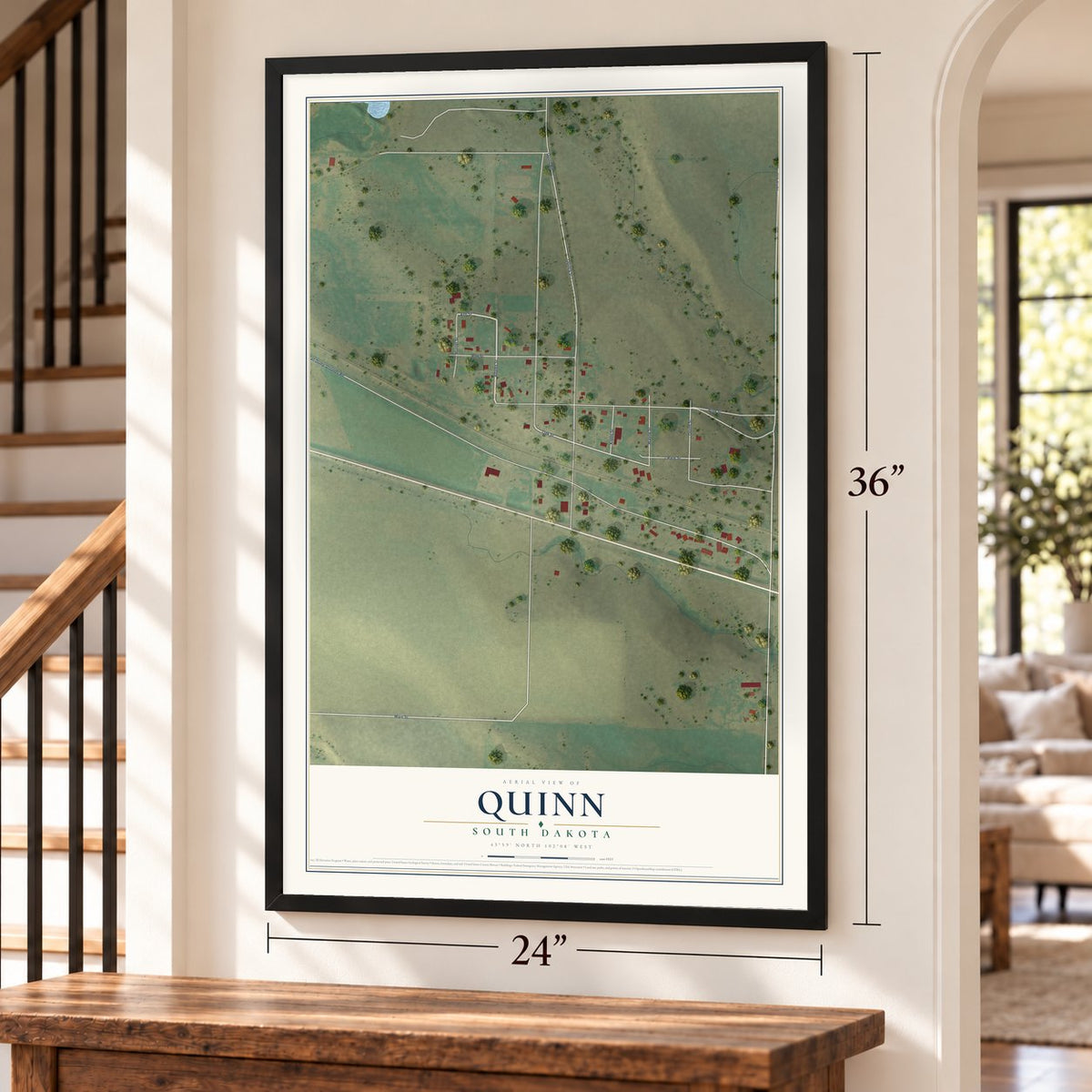 Quinn, South Dakota map, 24 x 36 inch print in a black frame by a staircase