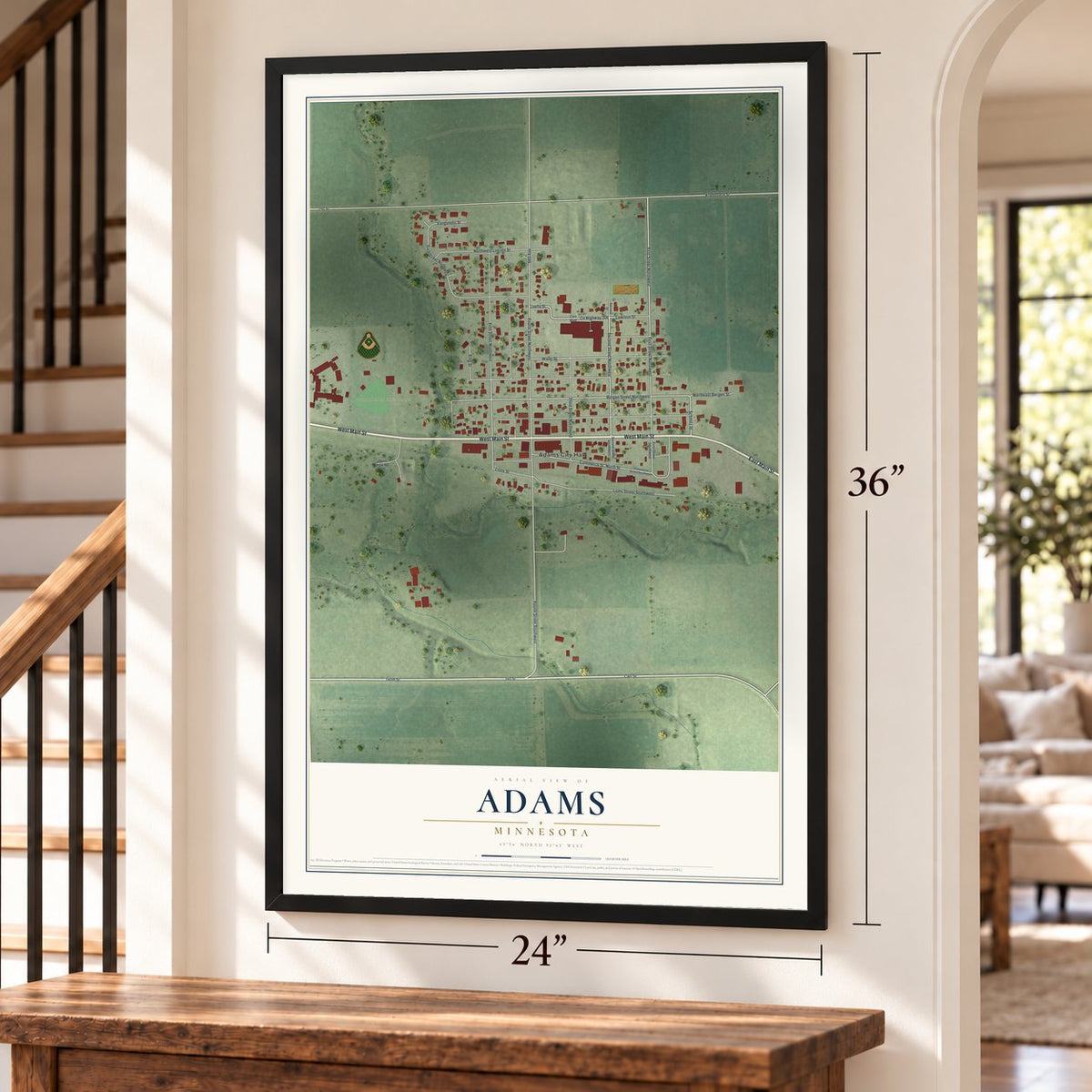 Adams, Minnesota map, 24 x 36 inch print in a black frame by a staircase