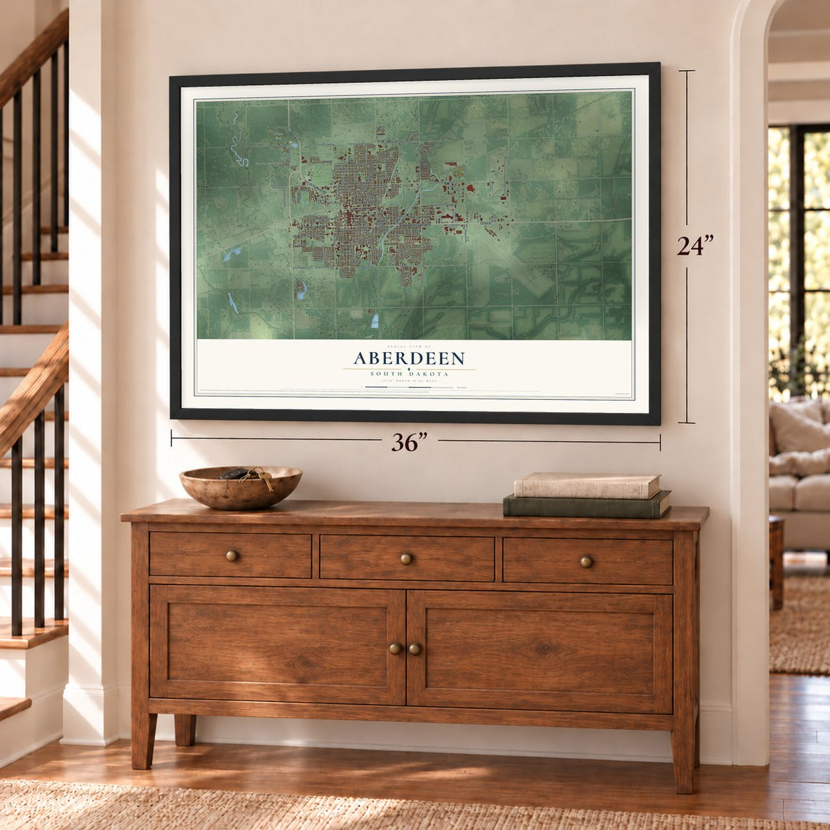 Aberdeen, South Dakota map, 24 x 36 inch print in a black frame above a dresser by a staircase