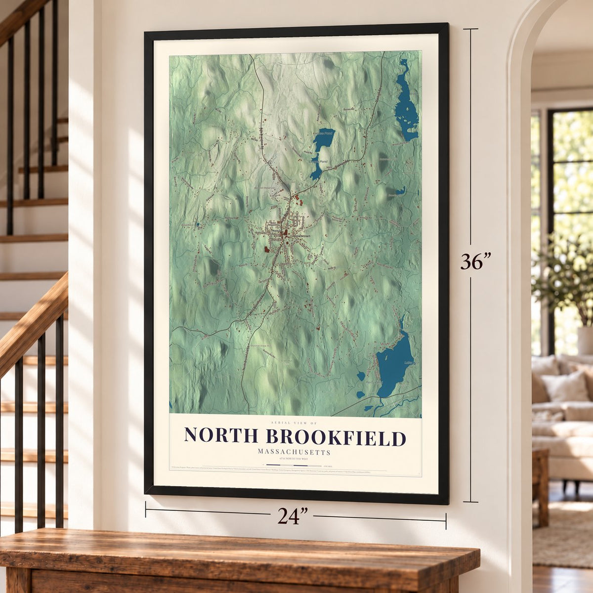 North Brookfield, Massachusetts map, 24 x 36 inch print in a black frame by a staircase