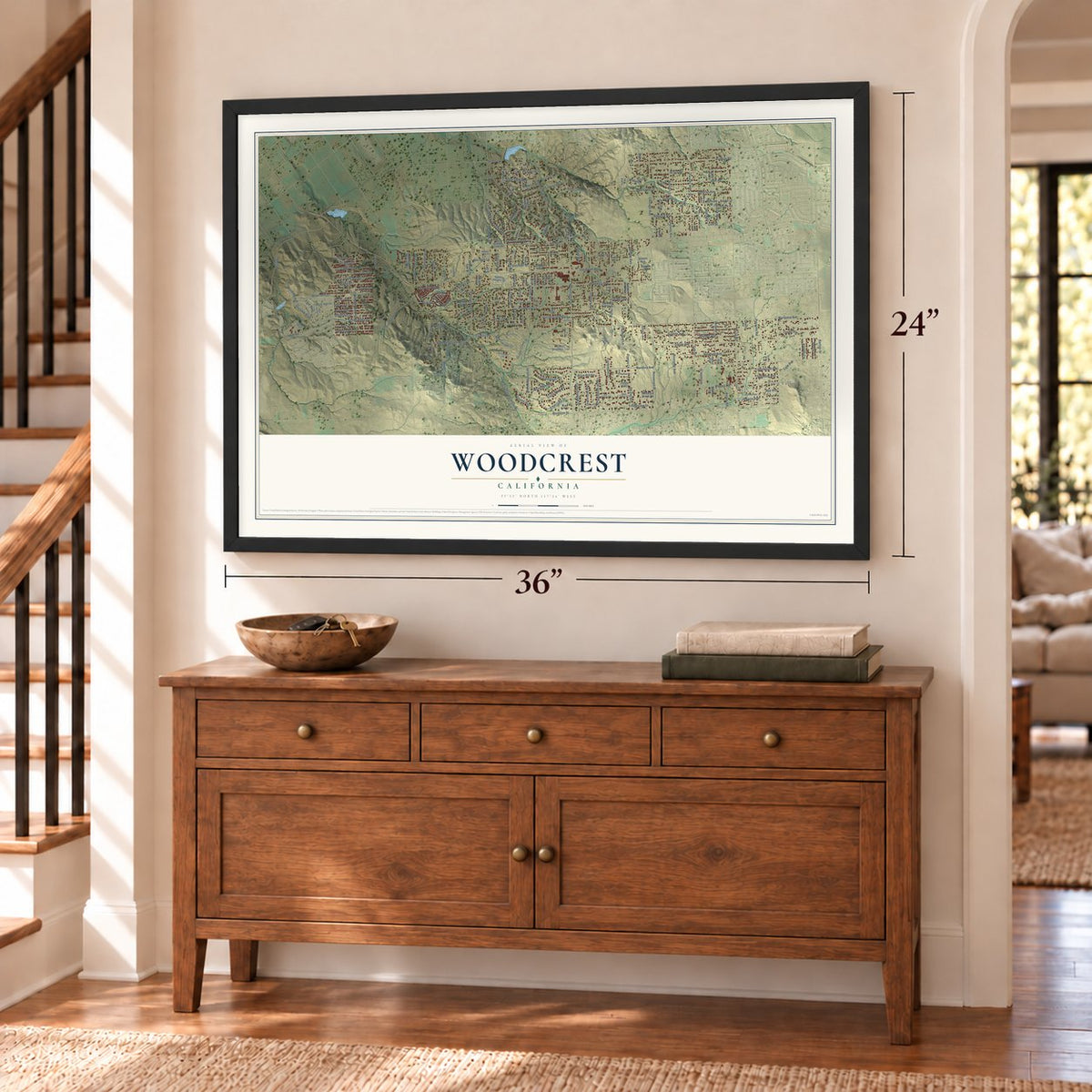 Woodcrest, California map, 24 x 36 inch print in a black frame above a dresser by a staircase