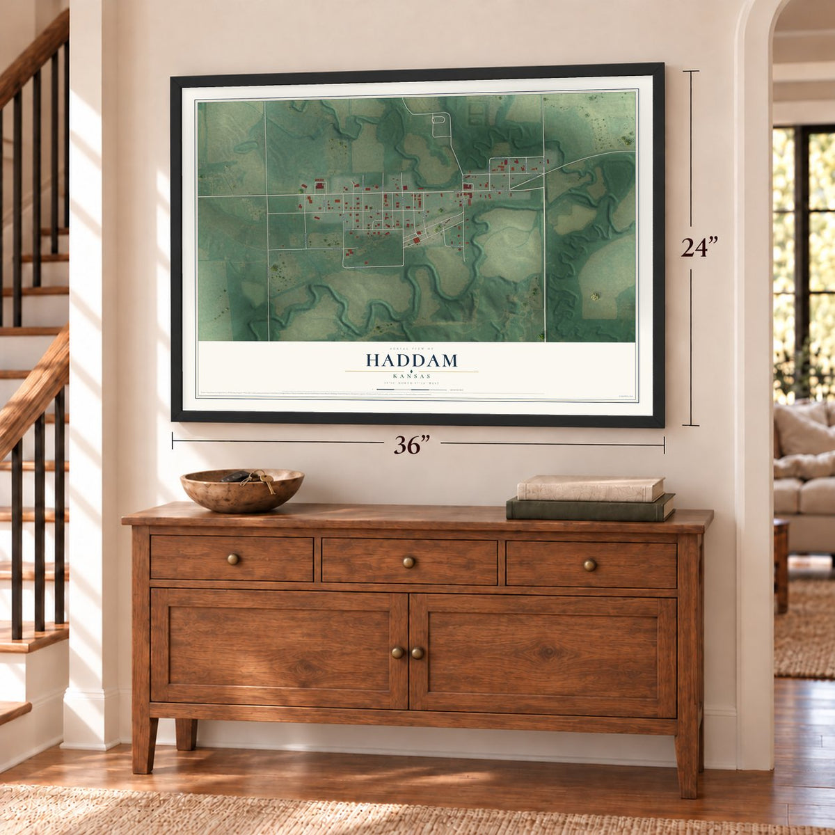 Haddam, Kansas map, 24 x 36 inch print in a black frame above a dresser by a staircase