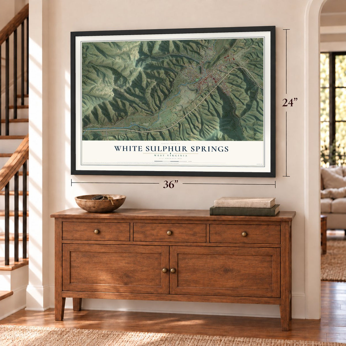 White Sulphur Springs, West Virginia map, 24 x 36 inch print in a black frame above a dresser by a staircase