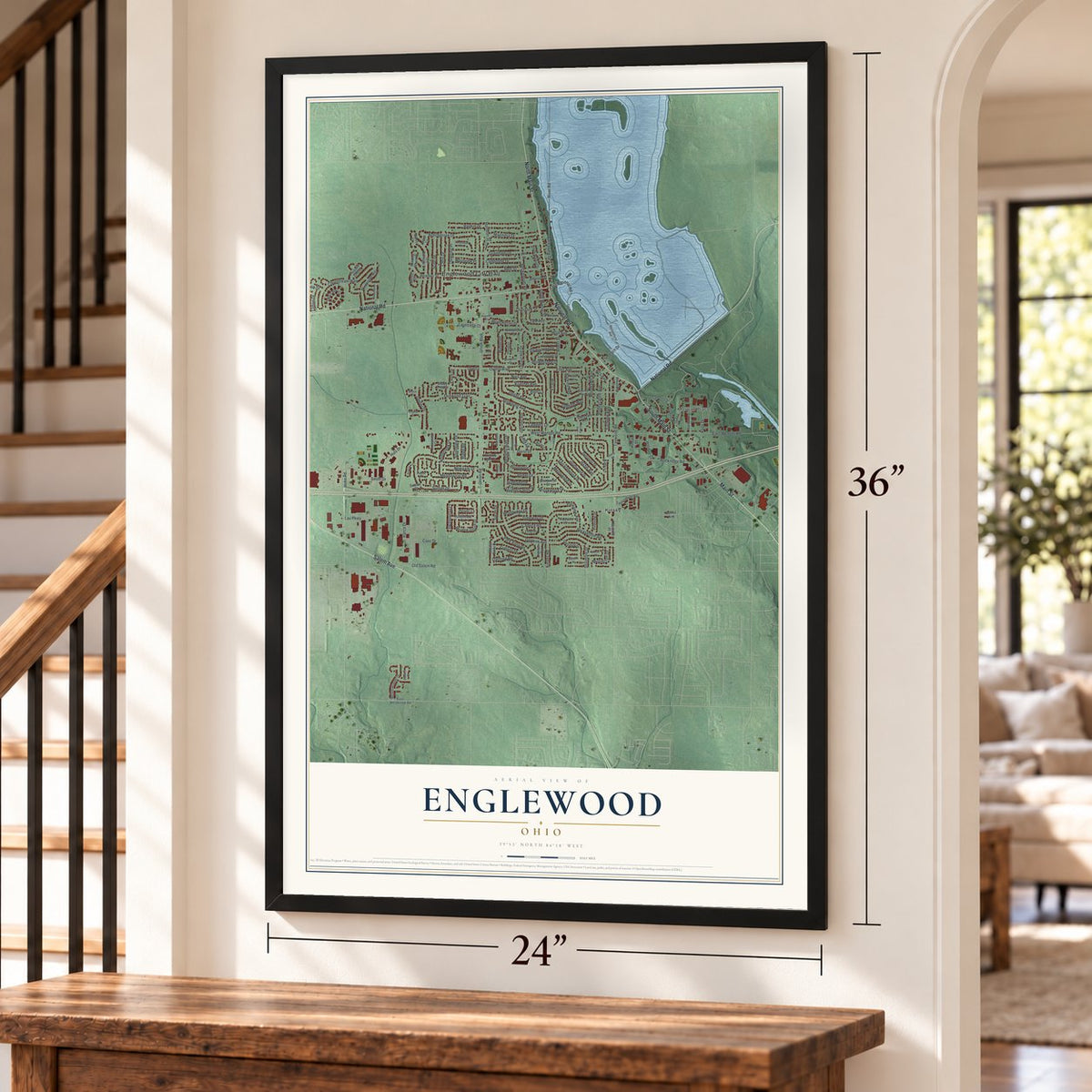 Englewood, Ohio map, 24 x 36 inch print in a black frame by a staircase
