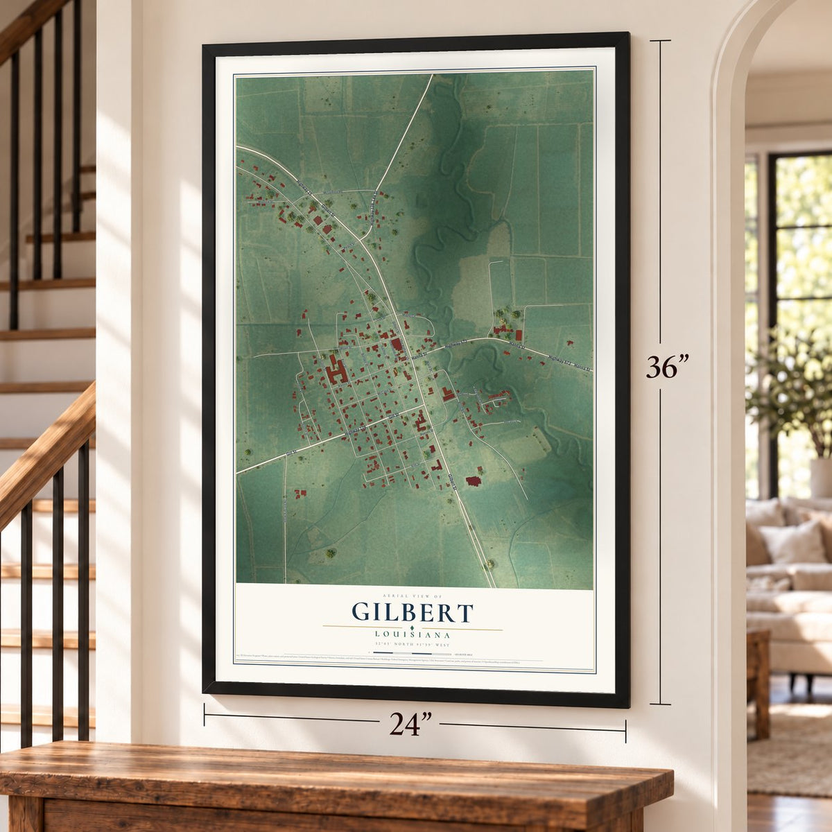 Gilbert, Louisiana map, 24 x 36 inch print in a black frame by a staircase