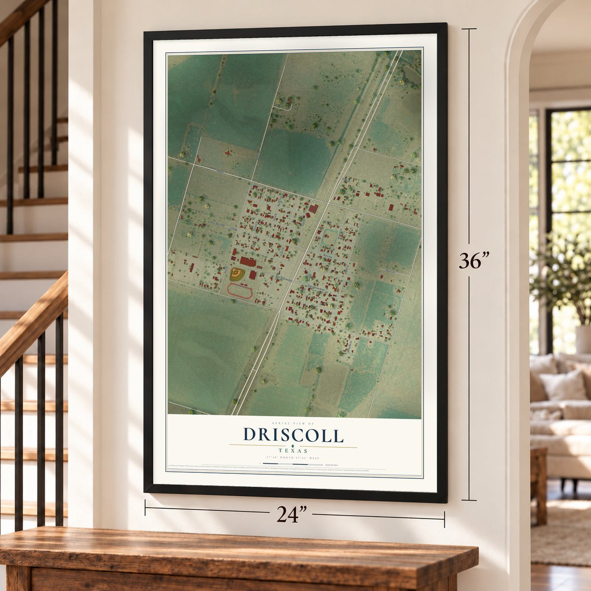 Driscoll, Texas map, 24 x 36 inch print in a black frame by a staircase