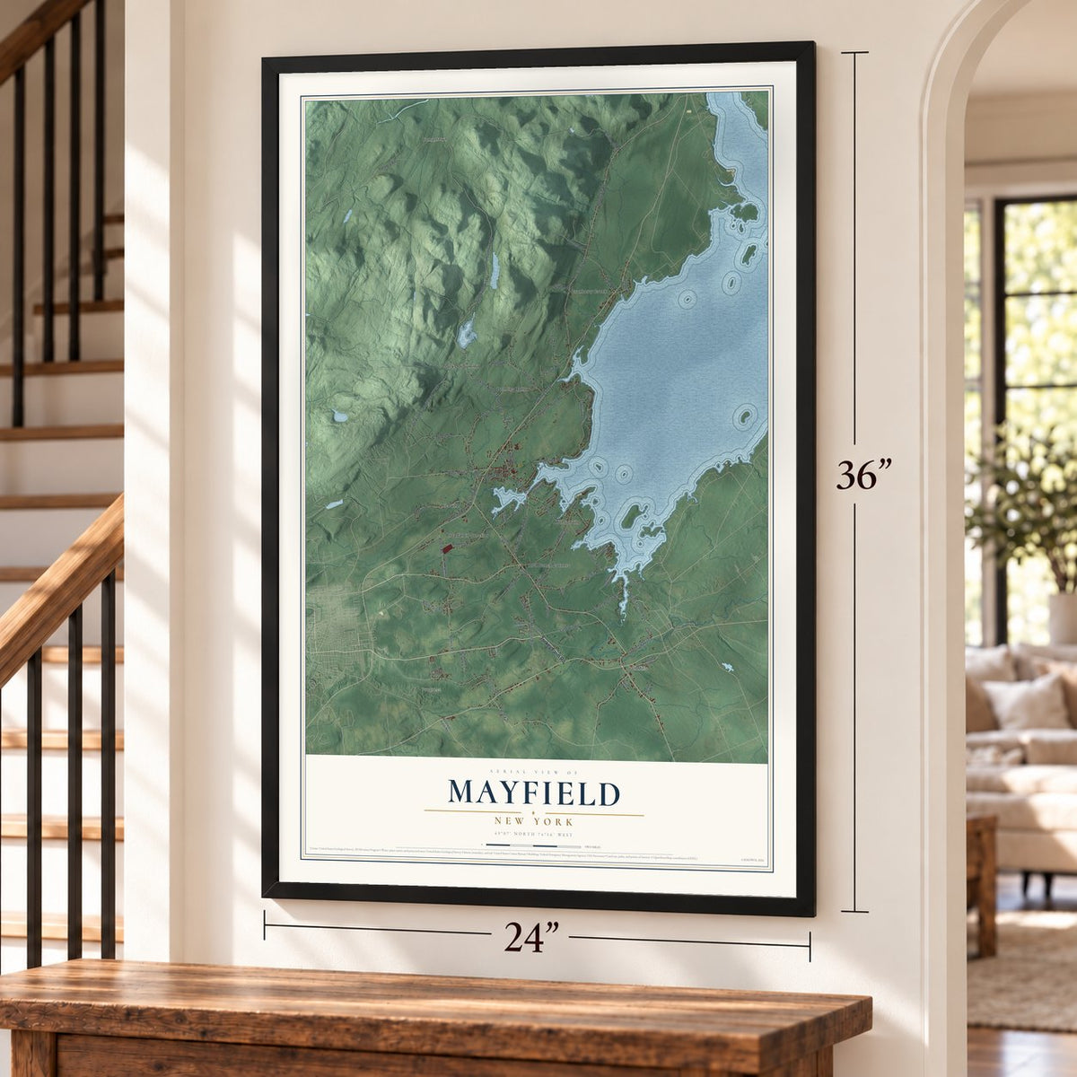 Mayfield, New York map, 24 x 36 inch print in a black frame by a staircase